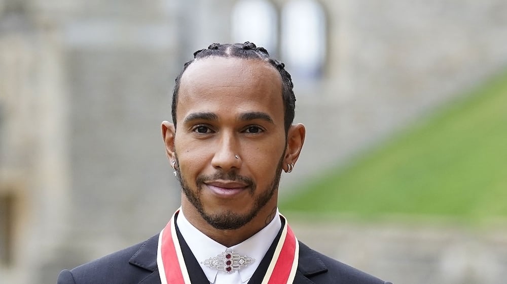 Sir Lewis Hamilton after he was made a Knight Bachelor by the Prince of Wales during a investiture ceremony at Windsor Castle. Picture date: Wednesday December 15, 2021.