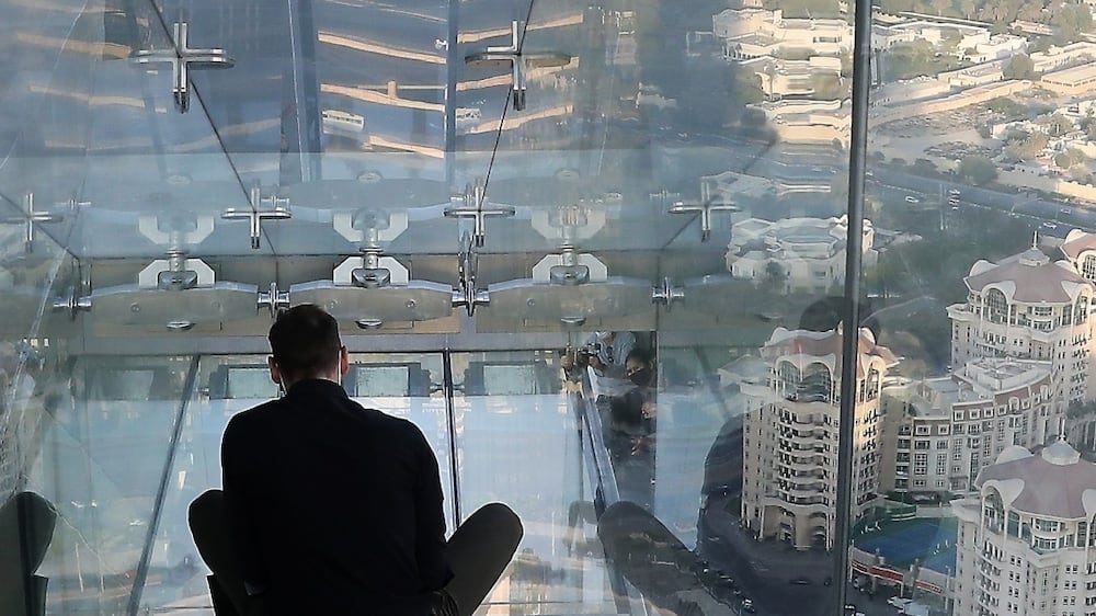 What's it like to walk and glide on the glass floors at Sky Views Dubai?