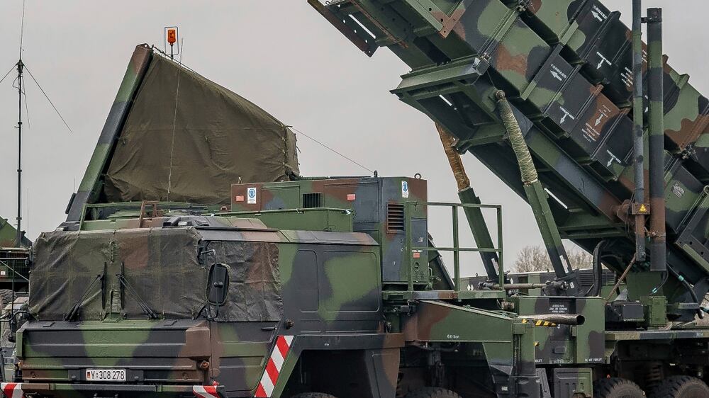 Ready-for-combat "Patriot" anti-aircraft missile systems of the German forces Bundeswehr's anti-aircraft missile squadron 1 stand on the airfield of military airport during a media presentation in Schwesing, Germany, Thursday, March 17, 2022.  Some units of the squadron are already on their way to Slovakia to reinforce NATO's eastern flank.  (Axel Heimken / dpa via AP)