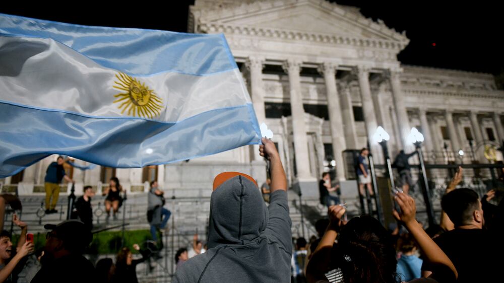 Argentines protest as new leader deregulates economy