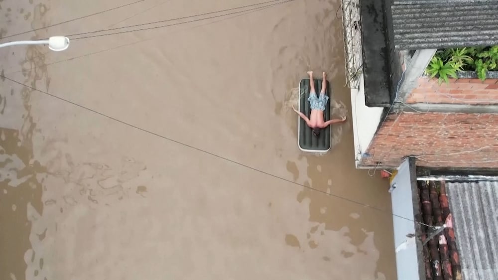 Two dams burst in Brazil causing mass floods