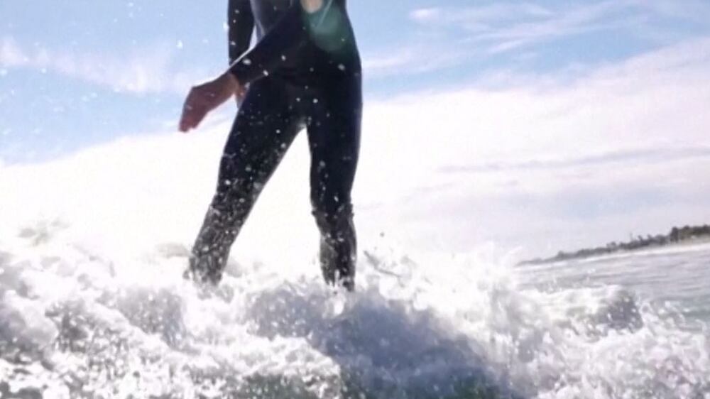 Florida's Surfing Santas hit winter waves for good cause