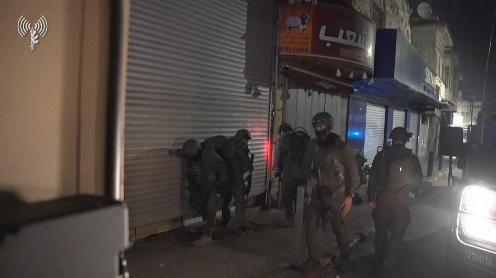 Israeli forces raid money exchange shops in occupied West Bank