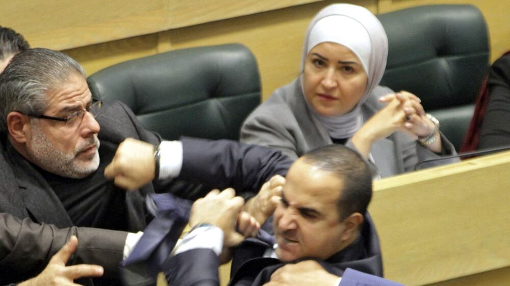 Watch Jordanian members of parliament scuffle during debate