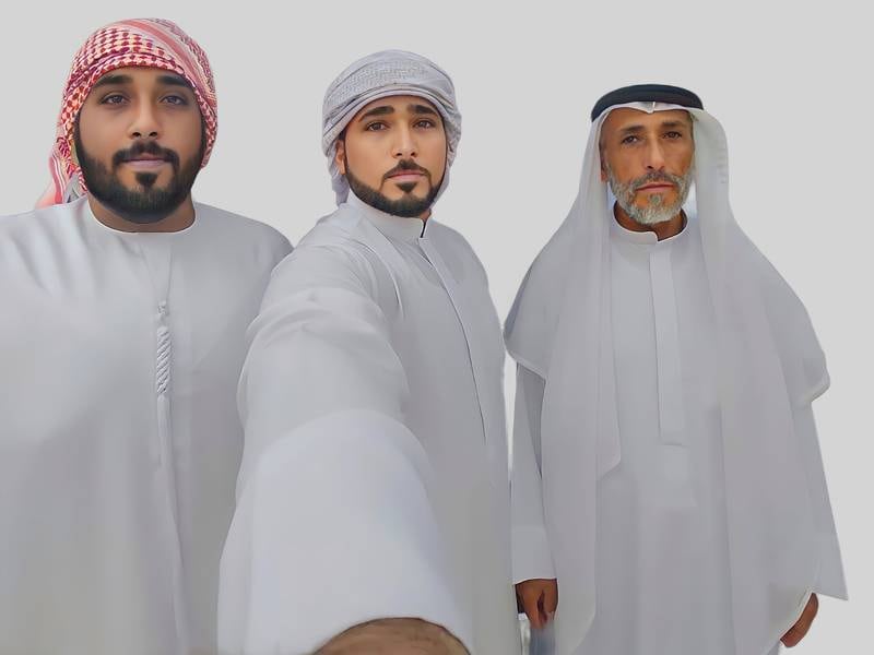 Sgt Omar Khalifa Al Ketbi, left, with his brother Capt Dr Salem Al Ketbi and his father Khalifa Al Ketbi during this year's Eid Al Fitr. Photo: Salem Al Ketbi