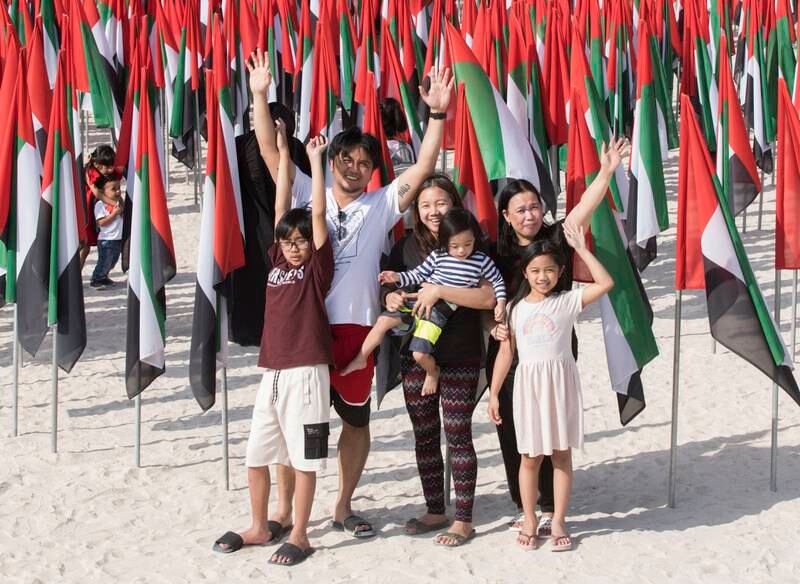 Jerecho Borja and his family attend the National Day festivities at Kite Beach in Dubai. Ruel Pableo for The National