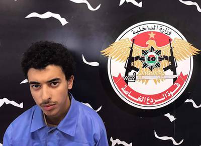 A photo released on the Facebook page of Libya's Ministry of Interior's Special Deterrence Force on May 24, 2017 claims to shows Hashem Abedi, the brother of the man suspected of carrying out the bombing in the British city of Manchester, after he was detained in Tripoli for alleged links to the Islamic State (IS) group.Libya arrested a brother and father of Salman Abedi who is suspected of the bombing at a pop concert killing 22 people, including children on May 22, 2017. / AFP PHOTO / LIBYA'S SPECIAL DETERRENCE FORCE / HO / RESTRICTED TO EDITORIAL USE - MANDATORY CREDIT "AFP PHOTO / LIBYA'S SPECIAL DETERRENCE FORCE" - NO MARKETING NO ADVERTISING CAMPAIGNS - DISTRIBUTED AS A SERVICE TO CLIENTS