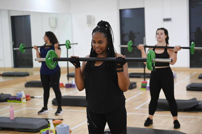 People take part in a gym class starting at 00.01 on the day indoor leisure centres reopened, at the Park Road Fusion Lifestyle Gym in London. EPA