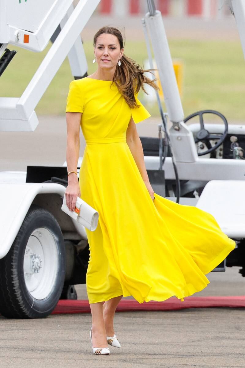 Duchess of Cambridge wears a yellow Roksanda dress to arrive in Kingston, Jamaica on March 22. Getty Images