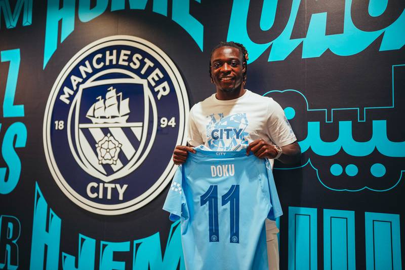 Jeremy Doku is presented as a Manchester City player. Photo: Manchester City FC