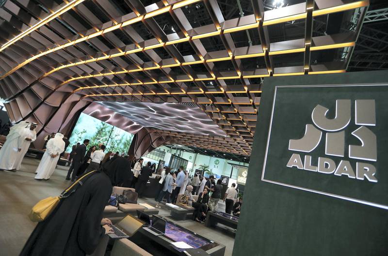 epa07509759 Visitors inspect the Al Dar section during the Cityscape 2019 Abu Dhabi exhibition, in Abu Dhabi, United Arab Emirates, 16 April 2019. The real estate event, an annual networking exhibition and conference focusing on all aspects of the property development cycle, runs from 16 to 18 April 2019.  EPA/ALI HAIDER