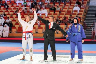Ishtar Azzawi, left, wins the 70kgs blue-belt final at the Abu Dhabi World Professional Jiu-Jitsu Championship 2019.