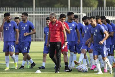 Carlos Queiroz with Iran plyers during training in Tehran. AP