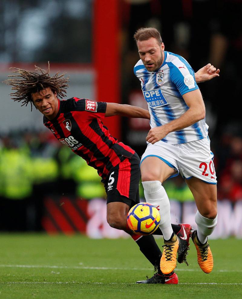 Centre-back: Nathan Ake (Bournemouth) – Ensured that, despite being down to 10 men for half the game, Bournemouth kept a clean sheet as they beat Huddersfield 4-0. John Sibley / Reuters