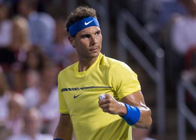Rafael Nadal, of Spain, reacts after winning the first set over Denis Shapovalov, of Canada, at the Rogers Cup tennis tournament Thursday, Aug. 10, 2017, in Montreal. (Paul Chiasson/The Canadian Press via AP)