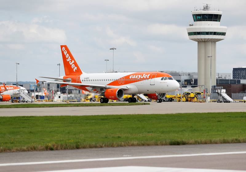 An Easyjet Airbus aircraft taxis close to the northern runway at Gatwick Airport in Crawley, Britain, August 25, 2021. Reuters