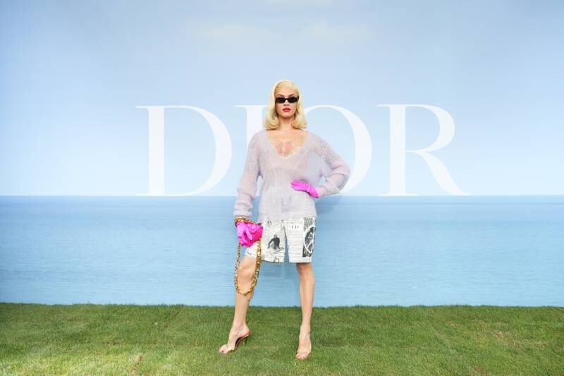 US model, make-up artist, recording artist and reality television personality Miss Fame attends the Dior Homme photocall. Getty Images For Christian Dior
