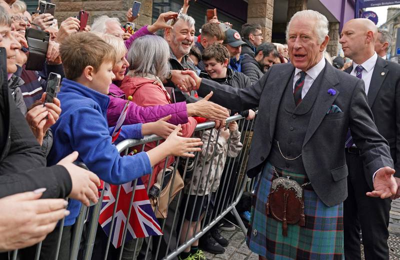 Britain's King Charles III greets members of the public in Dunfermline, south-east Scotland. His visit is to formally mark the conferral of city status on the former town. AFP