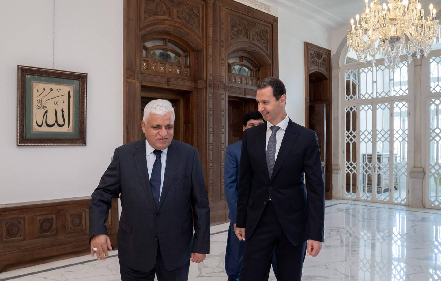 Syrian President Bashar Al Assad receives Faleh Fayyad, chairman of Iraq's Popular Mobilisation Forces, in Damascus. AFP