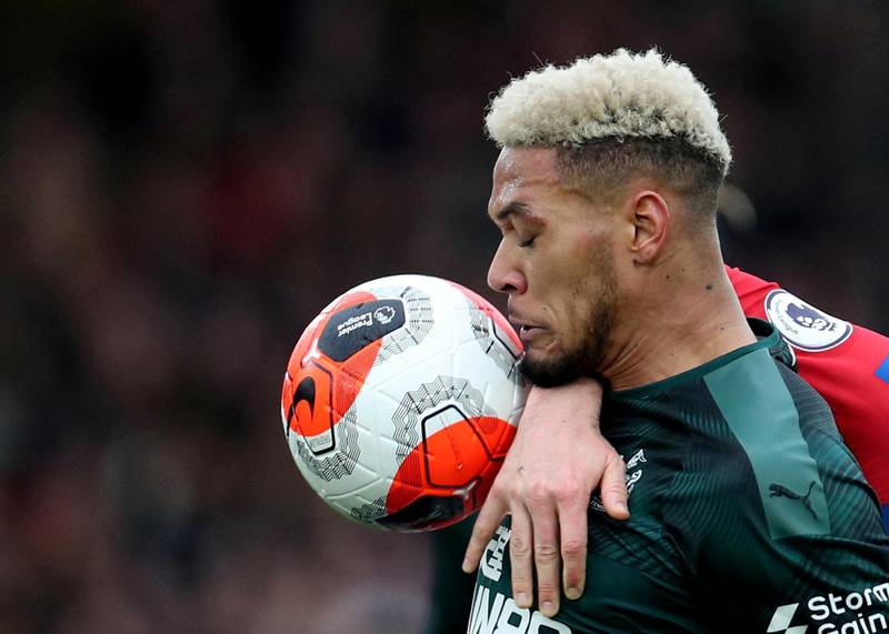 Joelinton takes a ball to the face during a Premier League match against Crystal Palace in February. Reuters