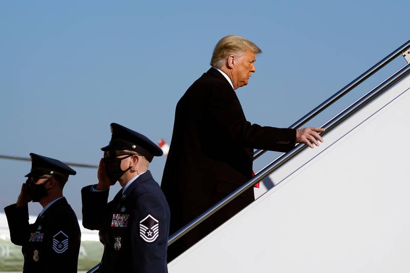 President Donald Trump boards Air Force One at Andrews Air Force Base, Md. The President is traveling to Texas. (AP Photo/Alex Brandon)