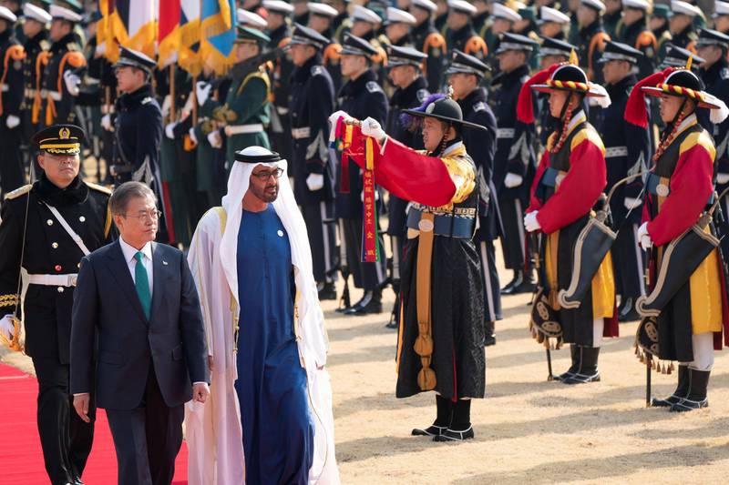 SEOUL, REPUBLIC OF KOREA (SOUTH KOREA)  - February 27, 2019: HH Sheikh Mohamed bin Zayed Al Nahyan, Crown Prince of Abu Dhabi and Deputy Supreme Commander of the UAE Armed Forces (R) and Moon Jae-in, President of the Republic of Korea (South Korea) (L) inspect the honor guard during a reception, at the Blue House.

( Rashed Al Mansoori / Ministry of Presidential Affairs )
---