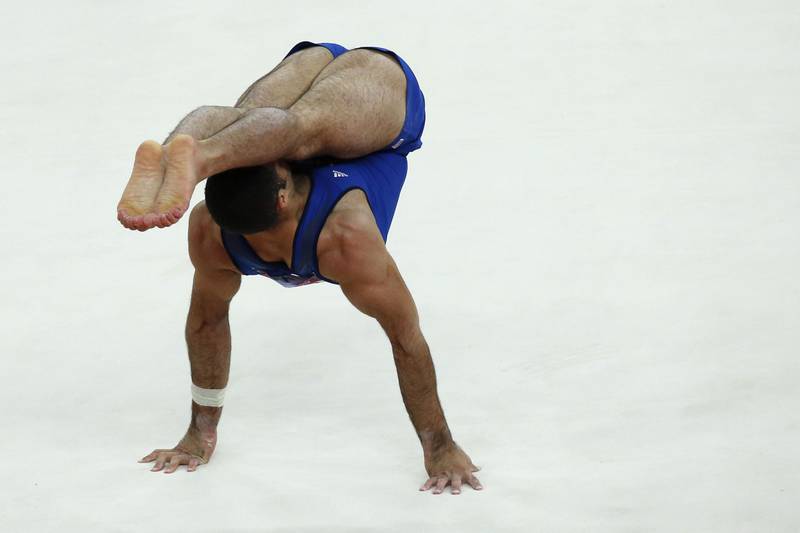 TOPSHOTSUS gymnast Danell Leyva performs on the floor during the men's individual all-around competition of the artistic gymnastics event of the London Olympic Games on August 1, 2012 at the 02 North Greenwich Arena in London. AFP PHOTO / THOMAS COEX