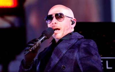 Singer Pitbull performs in Times Square during New Year's Eve celebrations in New York City. AFP