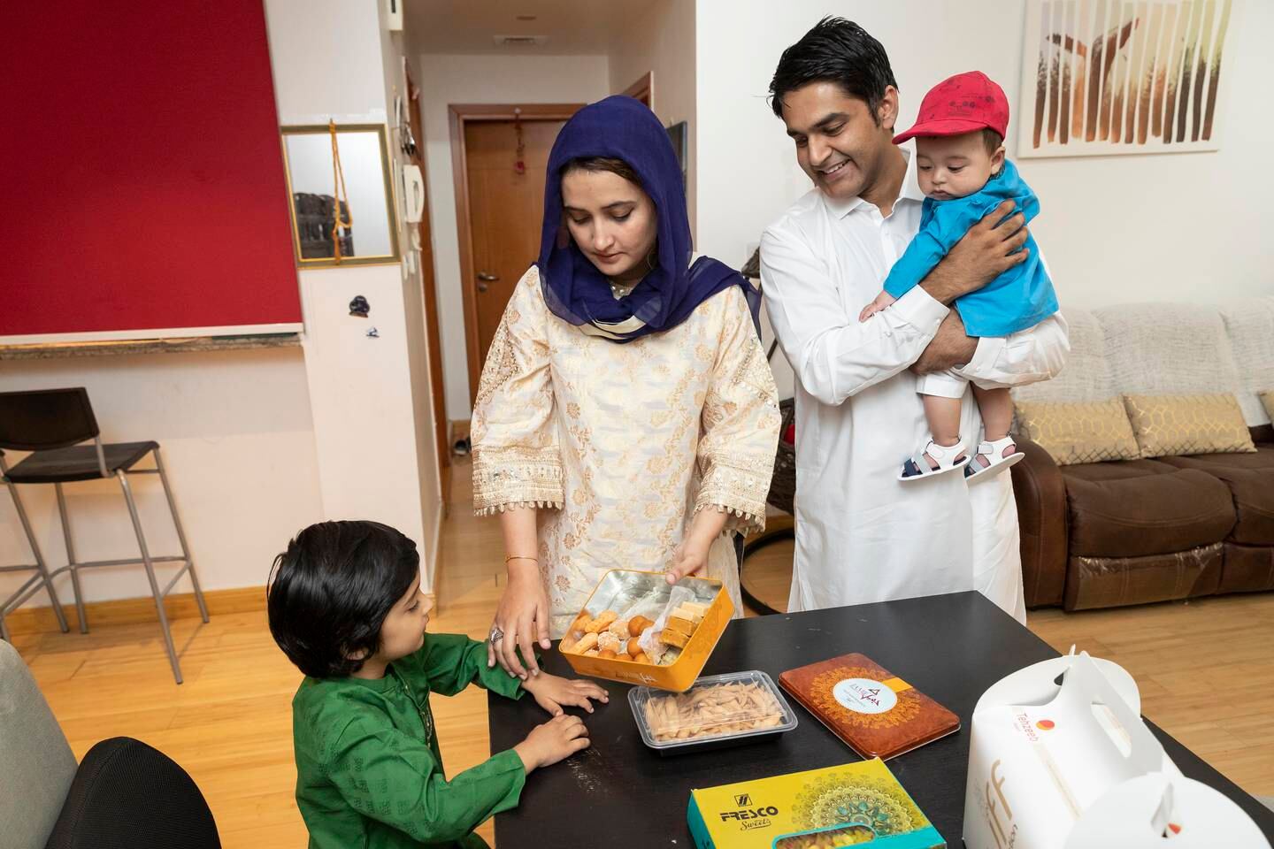 Dr Javairia Hassan, her husband Hassan Ashraf and their two sons are going on a staycation in Ras Al Khaimah for Eid Al Fitr. Antonie Robertson / The National
