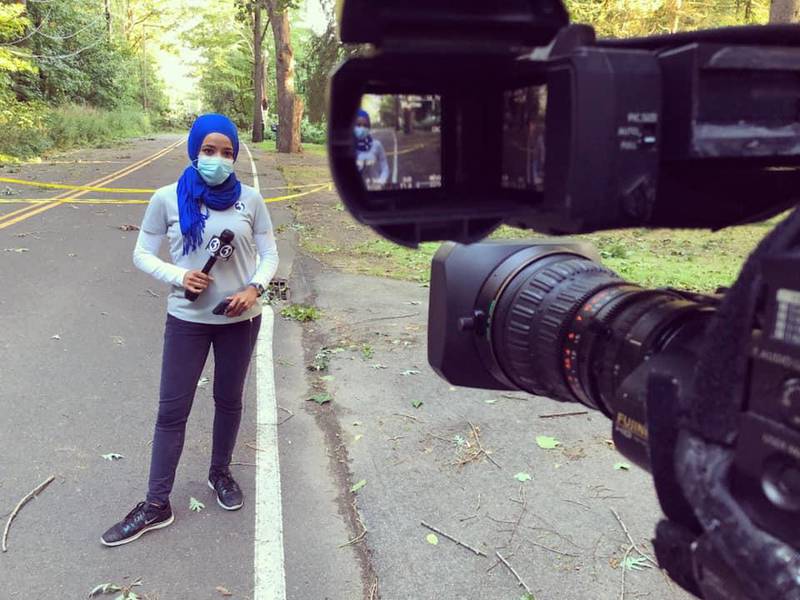 Ayah Galal on the scene of a story for WFSB in Connecticut. Galal is the first reporter in Connecticut to wear the hijab on the air.
