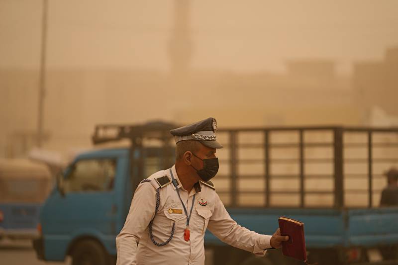Climate change is causing the sandstorms, many in Iraq believe. AP 