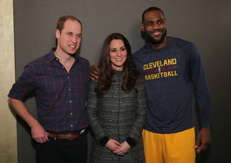 Prince William and Catherine, Duchess of Cambridge, backstage with basketball player LeBron James at the Cleveland Cavaliers v Brooklyn Nets game at Barclays Centre, on December 8, 2014 in Brooklyn, New York City. Getty Images via AFP