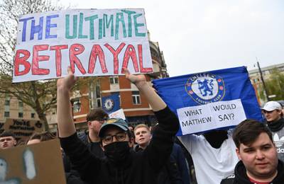 Chelsea fans protesting against the planned European Super League. EPA