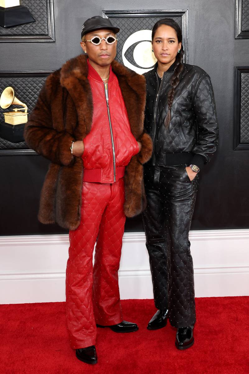 Williams and wife Lasichanh wearing matching quilted leather to attend the Grammy Awards on February 5, 2023. AFP 