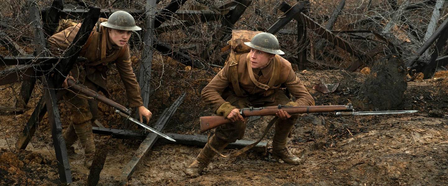 This image released by Universal Pictures shows Dean-Charles Chapman, left, and George MacKay in a scene from "1917," directed by Sam Mendes. The film is nominated for a Golden Globe for best motion picture drama. (FranÃ§ois Duhamel/Universal Pictures via AP)
