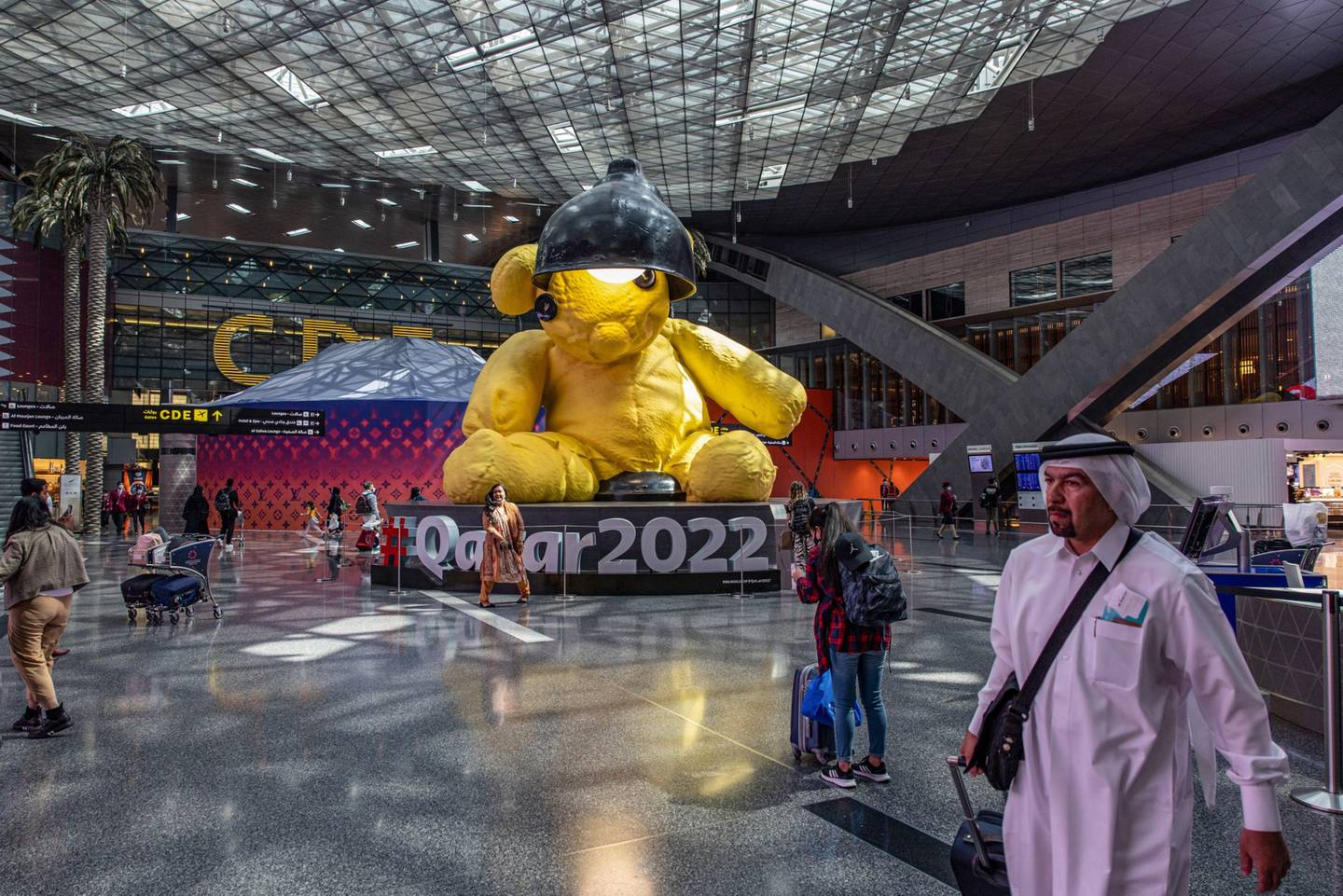 Travellers inside the departures terminal at Hamad International Airport in Doha, in June. Bloomberg