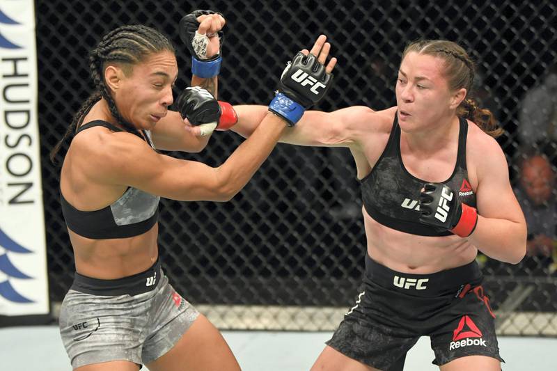ABU DHABI, UNITED ARAB EMIRATES - JULY 16: (R-L) Molly McCann of England punches Taila Santos of Brazil in their flyweight fight during the UFC Fight Night event inside Flash Forum on UFC Fight Island on July 16, 2020 in Yas Island, Abu Dhabi, United Arab Emirates. (Photo by Jeff Bottari/Zuffa LLC via Getty Images)