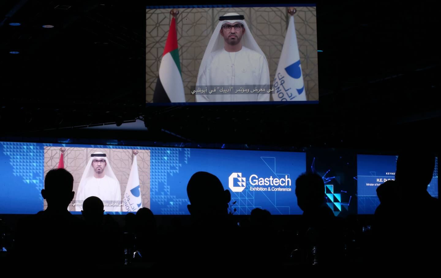 Attendees listen to recorded speech by Sultan Ahmed Al Jaber Minister of Industry and Advanced Technology and Managing Director and Group CEO of ADNOC of the UAE during the opening ceremony of the Gastech Exhibition and Conference in Dubai, September 21, 2021. EPA
