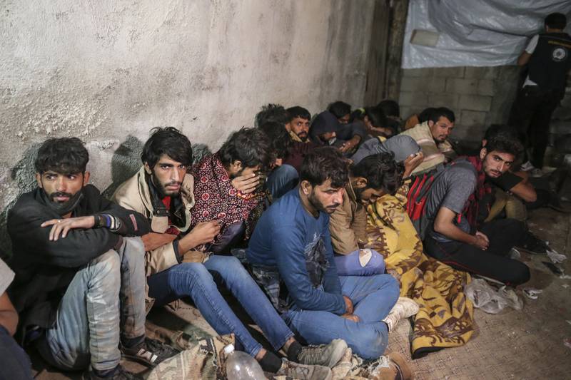 This group of migrants was detained by Turkish security forces amid concerns over a refugee crisis from Afghanistan. AP