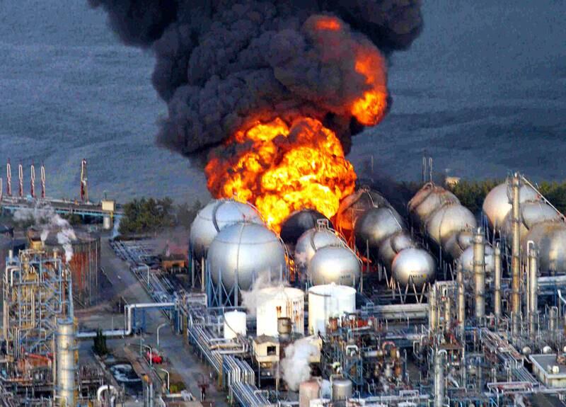 A fire rages at an oil refinery in Chiba city after an 8.8 magnitude quake hit northern Japan in March 2011