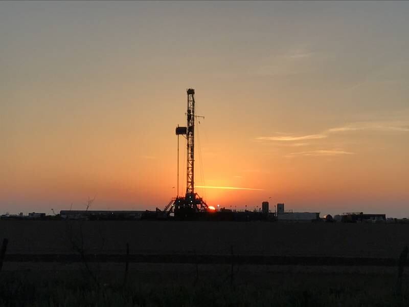 FILE PHOTO: A oil drilling rig is seen at sunrise near Midland, Texas, U.S., May 3, 2017.   REUTERS/Ernest Scheyder/File Photo