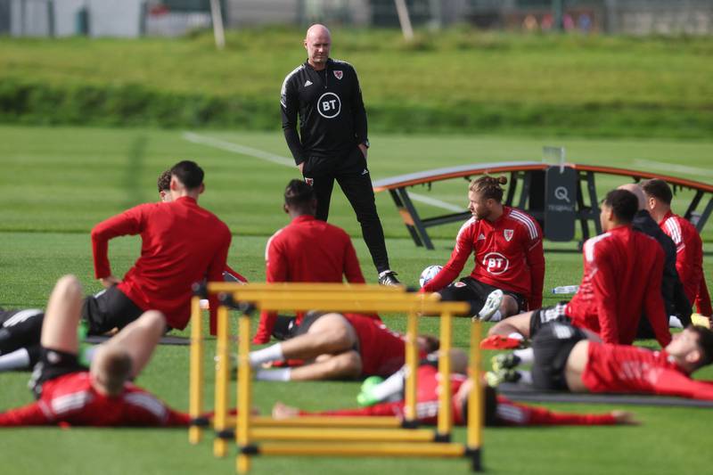 Wales manager Rob Page with his players during training for the Poland match. Action Images