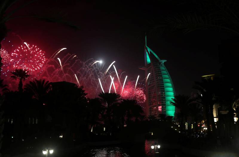 Fireworks explode over the Burj Al Arab hotel during the New Year celebrations in Dubai. Reuters