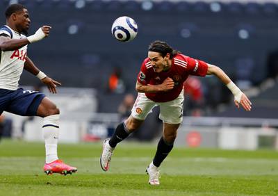 Soccer Football - Premier League - Tottenham Hotspur v Manchester United - Tottenham Hotspur Stadium, London, Britain - April 11, 2021 Manchester United's Edinson Cavani scores their second goal Pool via REUTERS/Adrian Dennis EDITORIAL USE ONLY. No use with unauthorized audio, video, data, fixture lists, club/league logos or 'live' services. Online in-match use limited to 75 images, no video emulation. No use in betting, games or single club /league/player publications.  Please contact your account representative for further details.