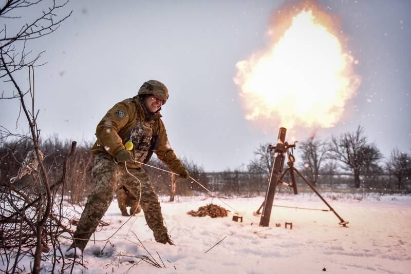 A Ukrainian soldier fires a mortar towards Russian positions, in the Donetsk region of eastern Ukraine. EPA