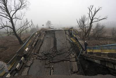 Russian soldiers destroyed this bridge as they withdrew from a village on the outskirts of Kyiv. AP Photo