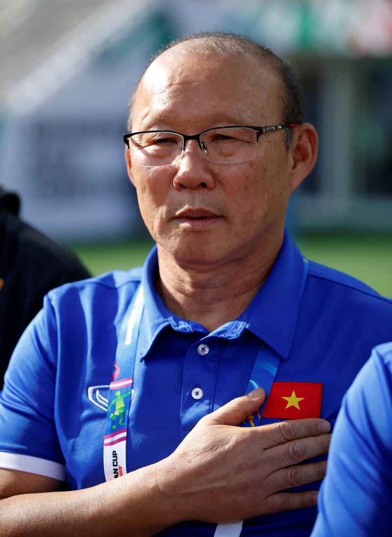 Park hang-Seo, head coach of Vietnam, stands for the national anthem. EPA