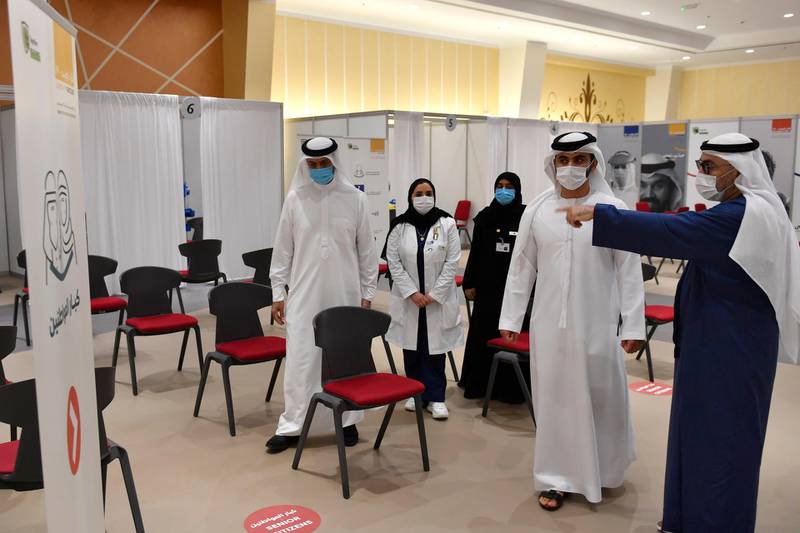 Sheikh Mansoor bin Mohammed, chairman of the emirate's Supreme Committee of Crisis and Disaster Management, visits a Covid-19 vaccination centre in Dubai on Sunday. Courtesy: Dubai Media Office