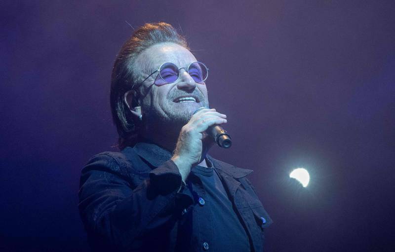 Irish lead singer of rock band U2, Bono performs in Berlin, on August 31, 2018. (Photo by Paul Zinken / dpa / AFP) / Germany OUT