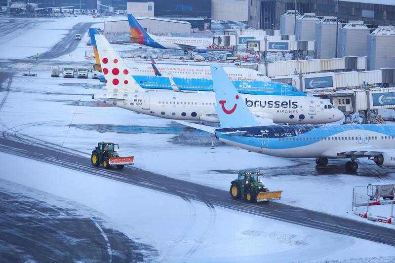 Manchester Airport's runways were temporarily closed on Thursday as snow ploughs cleared the airfield. Reuters